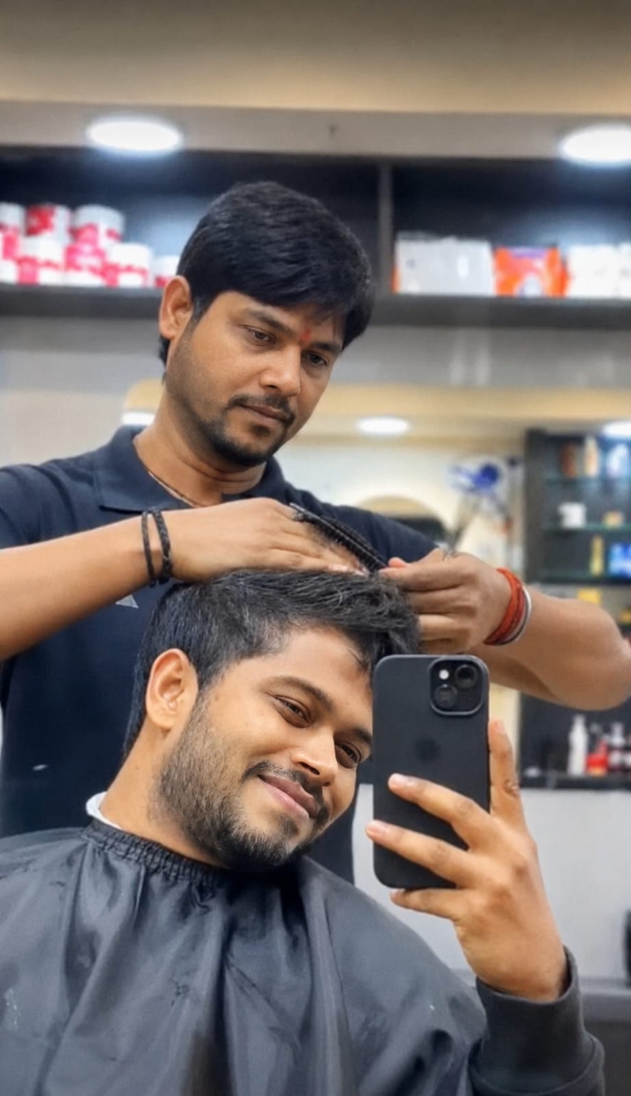 Men's haircut in progress at STAR Men's Professional Salon